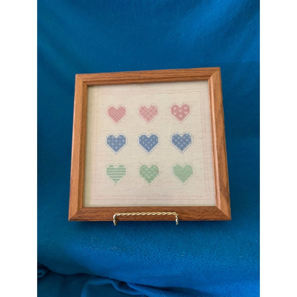 Framed Vintage embroidered /petipoint hearts on linen.  A sweet gift!